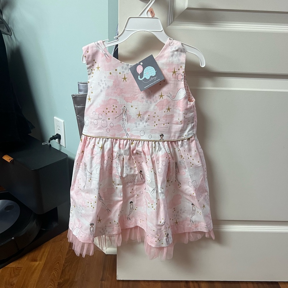 Lee story mermaid dress, sizer 4, New with tags, color pink